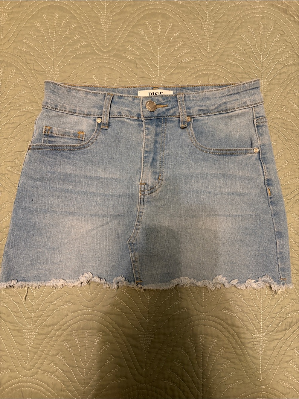 Light Blue Denim Mini Skirt with Distressed Hem